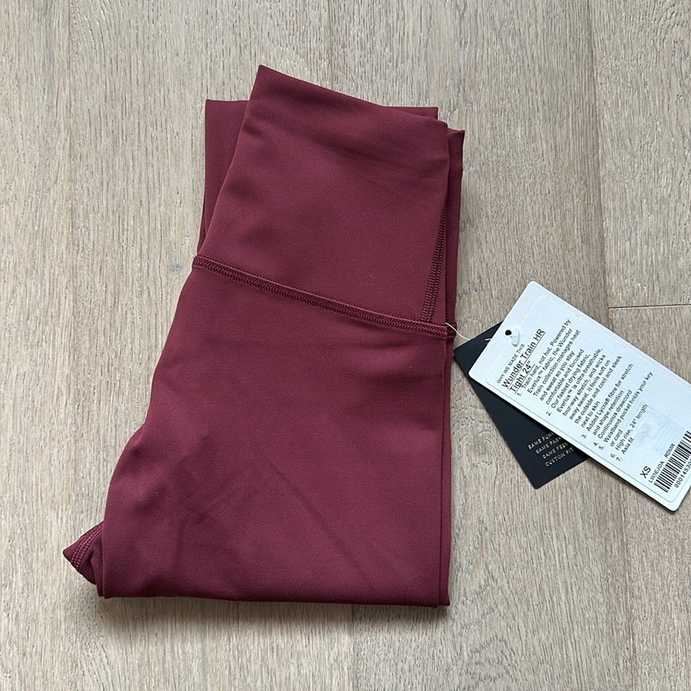 NWT wunder train tight 24" size XS red merlot lululemon